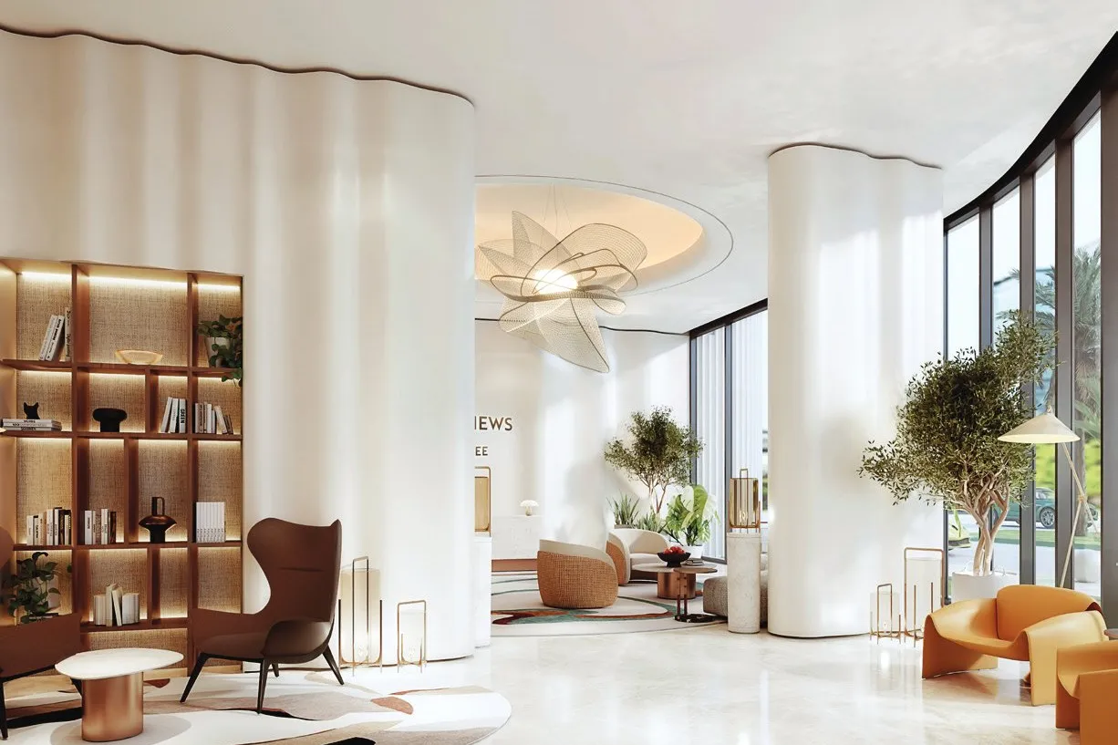 Lounge corner with bookshelves, armchairs and rippled white columns